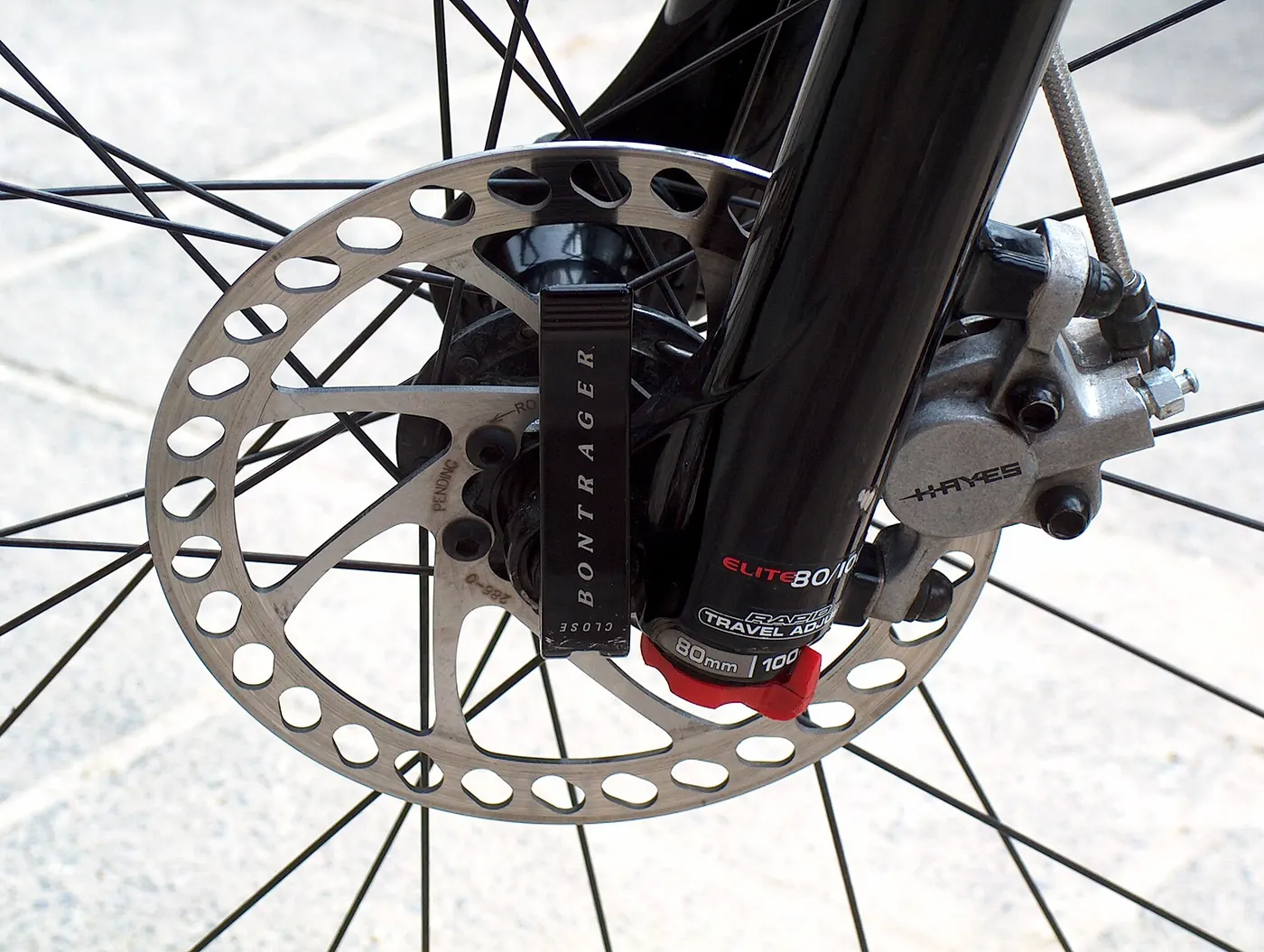A bicycle disc brake with a caliper and rotor.