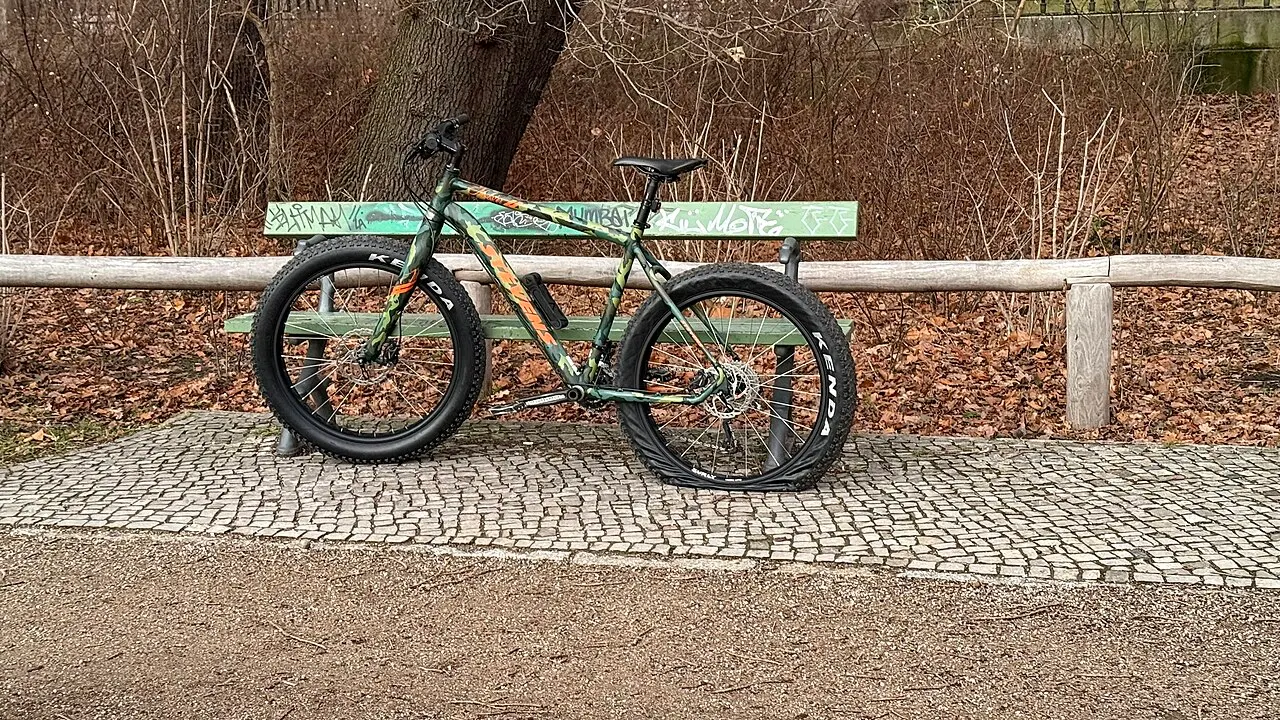 Fat-tire bicycle with visibly deflated tires