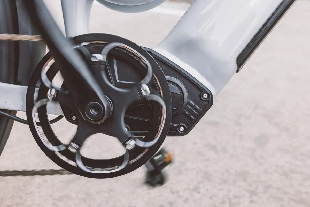 Electric bicycle crank and motor area in close view