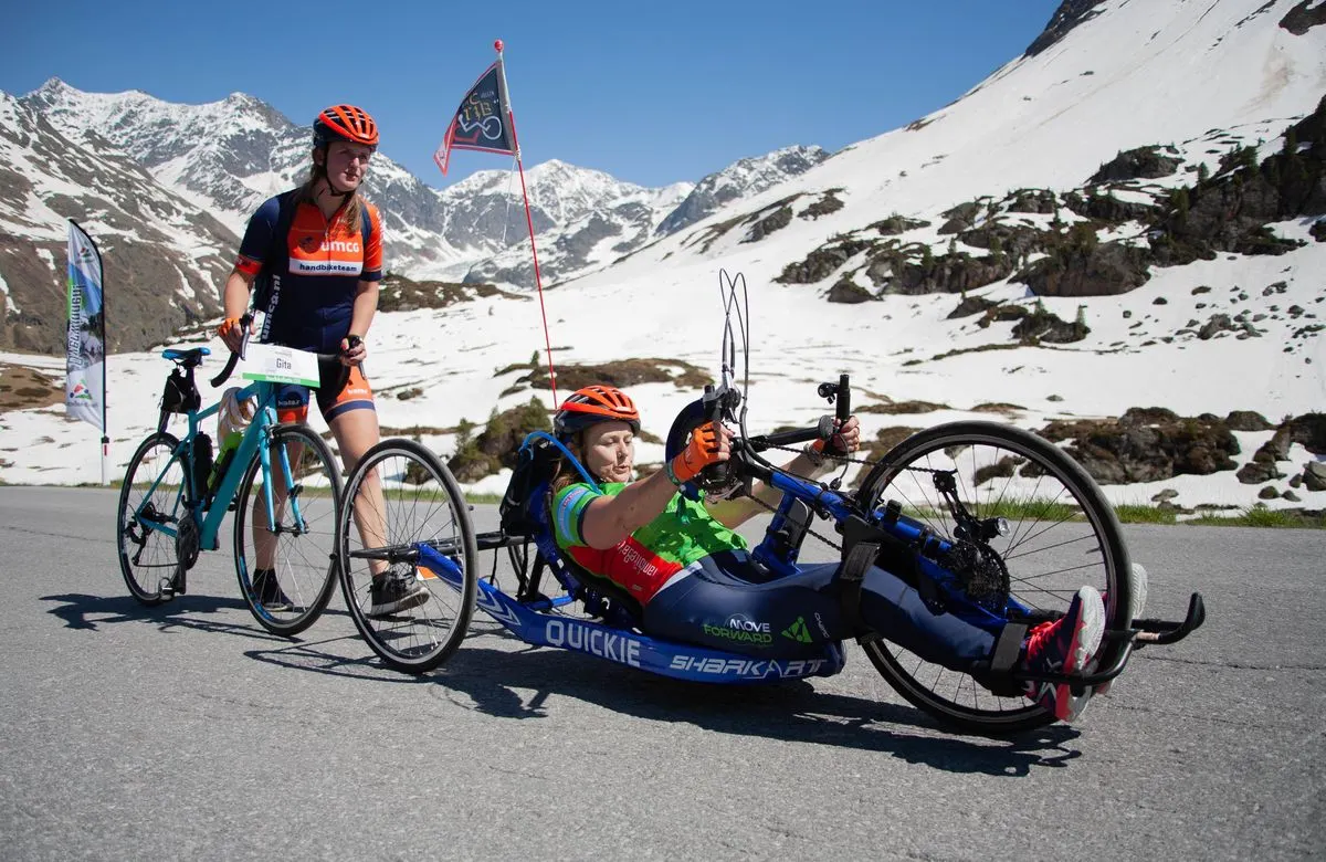 Handbike and mountain bike riders on a scenic route in Kaunertal, Tyrol.