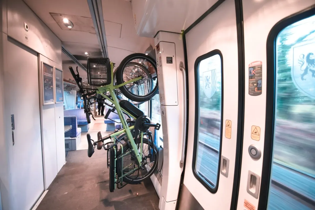 A green bicycle securely mounted inside a train in Bordeaux, France, showcasing convenient urban transport.
